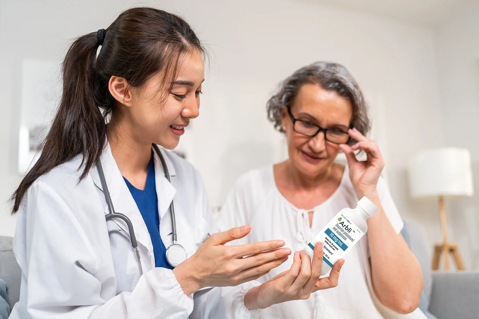 Caregiver giving consultation to patient Caregiver giving consultation to patient